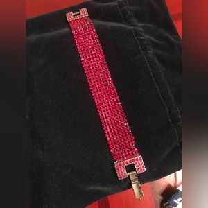 Swarovski deep red crystals bracelet with defect as shown.
Comes with box shown.